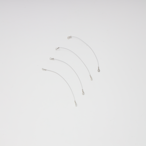 Close-up of superelastic nitinol memory wire for sale used in a compact actuator system.