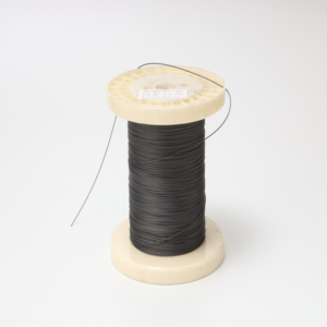 Superelastic Nitinol rope 0.15mm showing micro-scale flexibility and shape memory properties