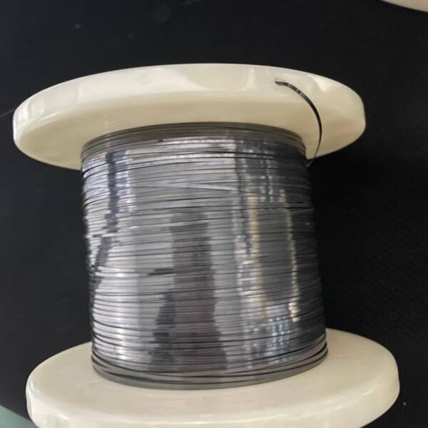Superelastic Nitinol flat wire in a robotic actuator