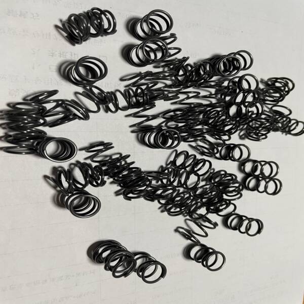 Custom nitinol wire spring with etched surface for industrial actuator